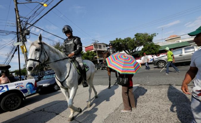 Ecuador presidential election goes to runoff between leftist, ex-banker 